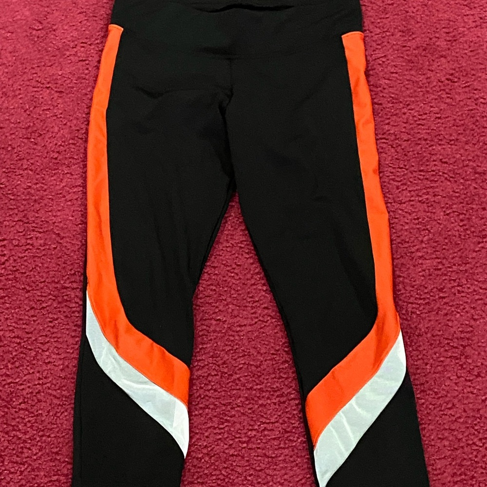 Kids Black Leggings with Orange and White Colorblock Side Panels